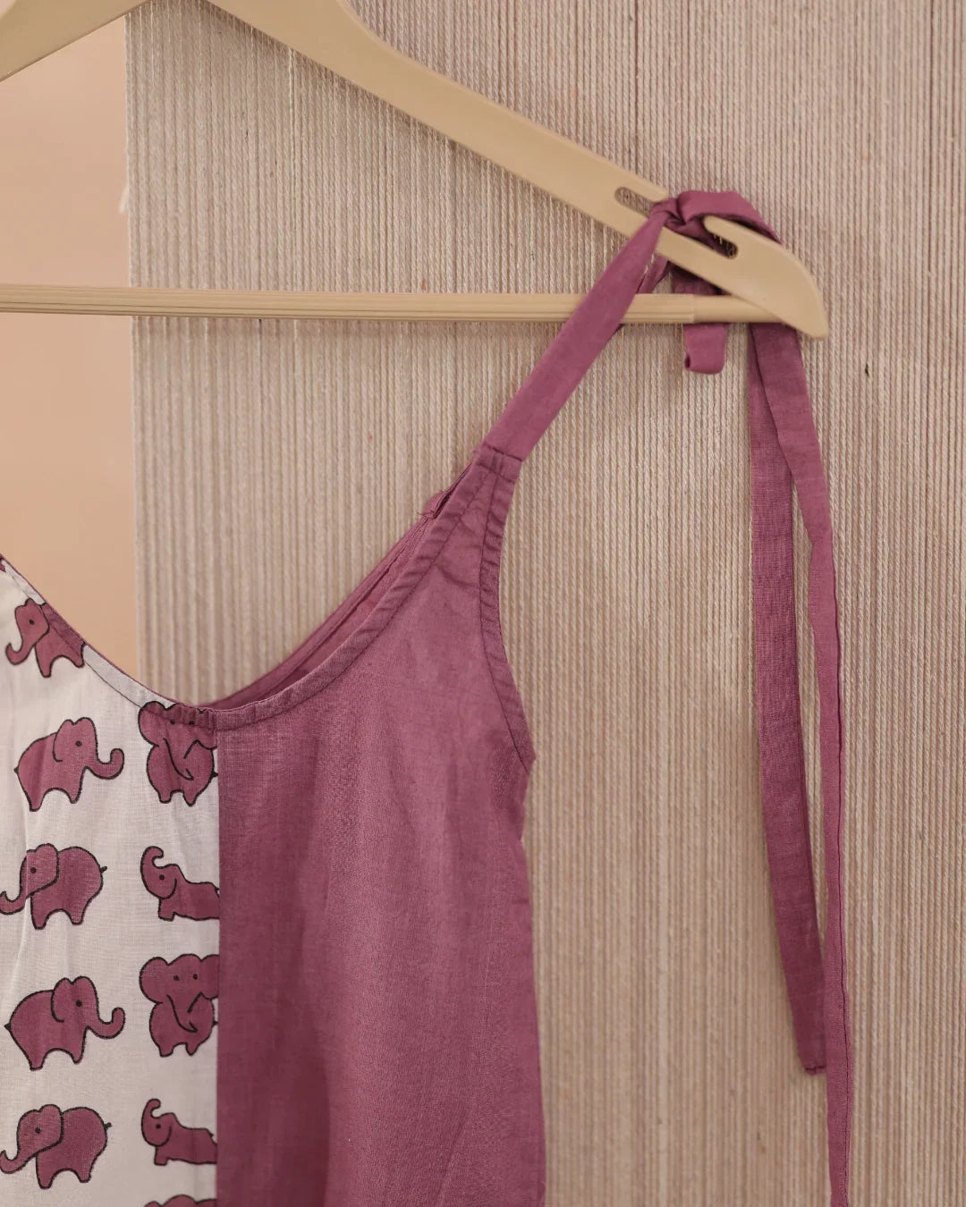 Organic cotton kids dress with purple elephant block print and tie-up shoulder strap